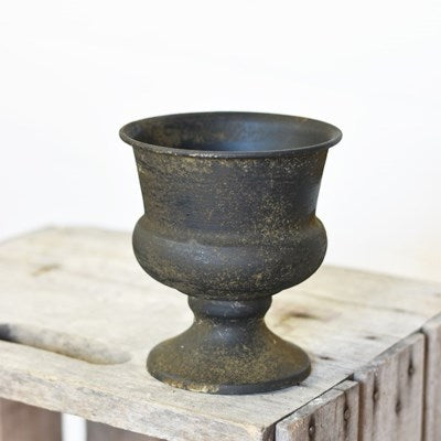 Old tin urn